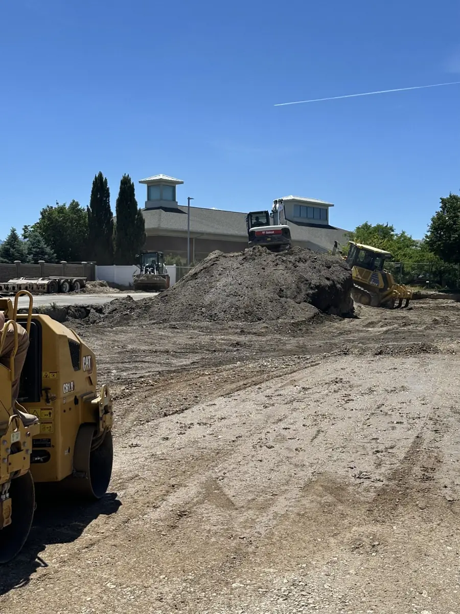 Grading and compacting the building pad